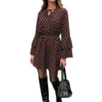 Woman wearing the Modarine polka dot bell-sleeve mini dress