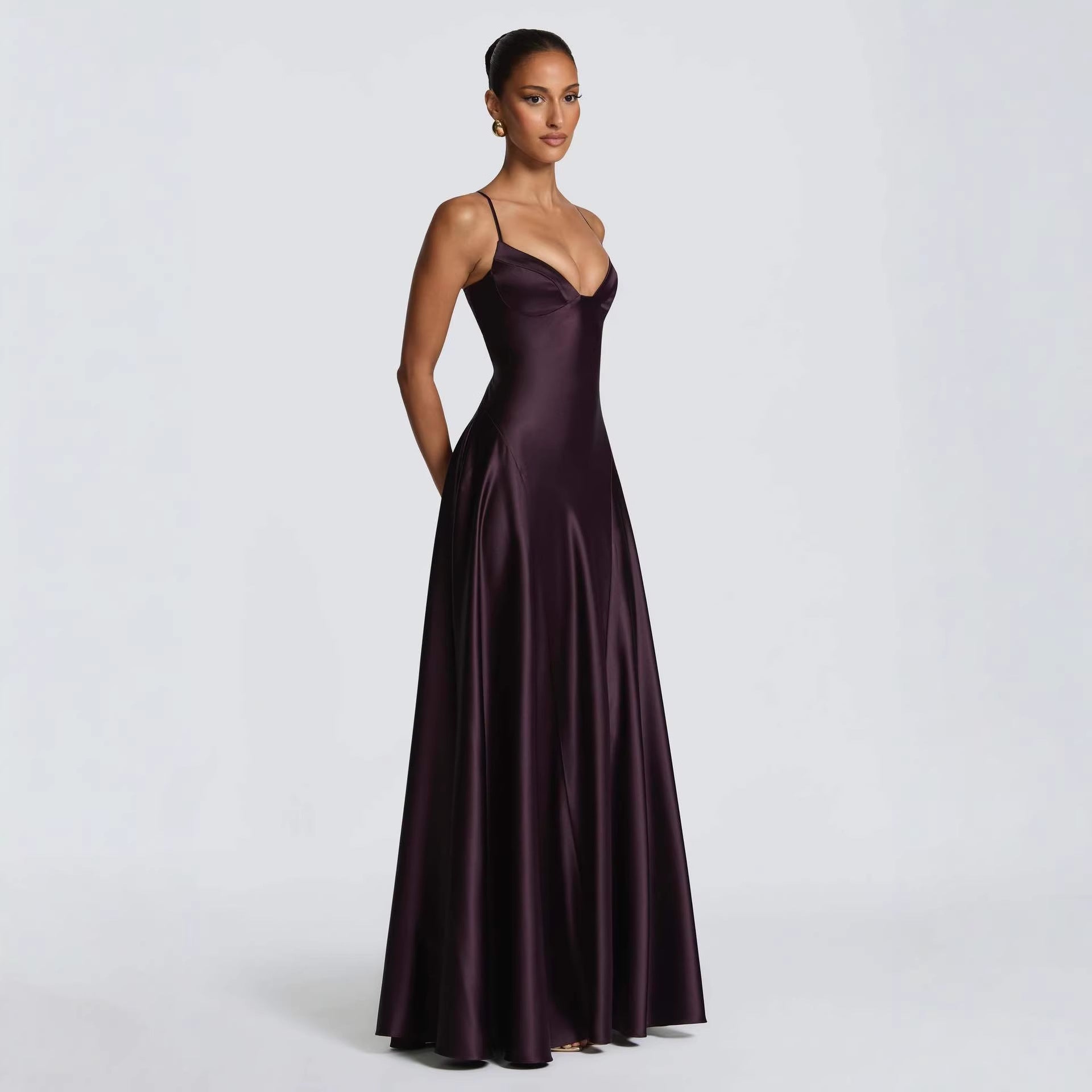 Woman wearing the Modarine lace-back satin maxi evening gown