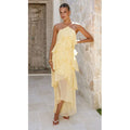 Woman wearing the Modarine tiered ruffle halter maxi dress