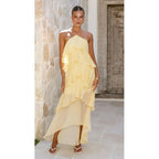 Woman wearing the Modarine tiered ruffle halter maxi dress