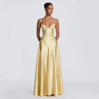 Woman wearing the Modarine lace-back satin maxi evening gown