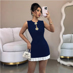 Woman wearing the Modarine contrast pleated-hem sleeveless mini dress
