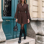 Woman wearing the Modarine polka dot bell-sleeve mini dress