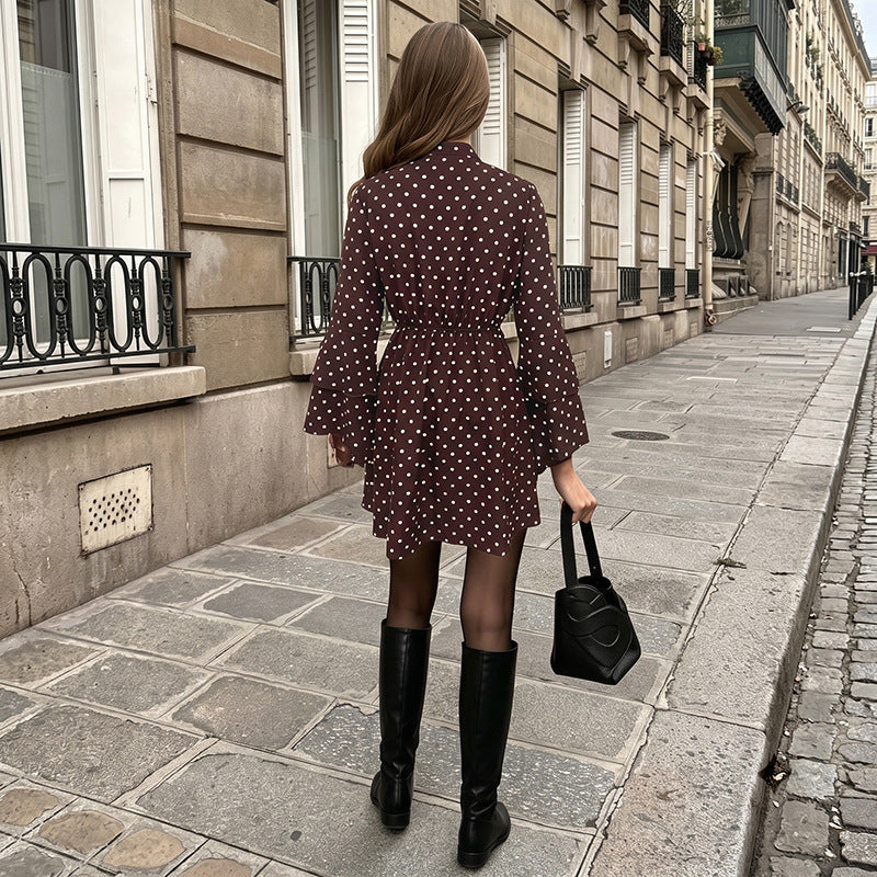 Woman wearing the Modarine polka dot bell-sleeve mini dress