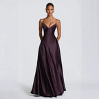 Woman wearing the Modarine lace-back satin maxi evening gown